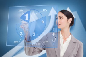 Smiling businesswoman using blue pie chart interface with arrows on background